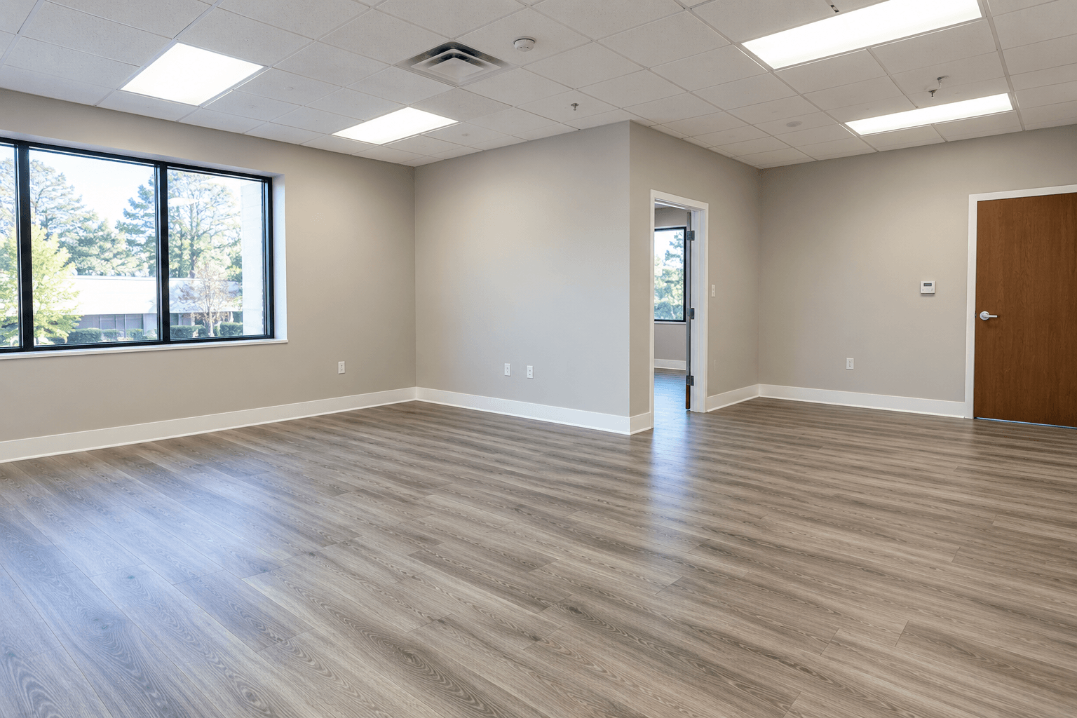Fully restored commercial interior after water damage repair by Bella