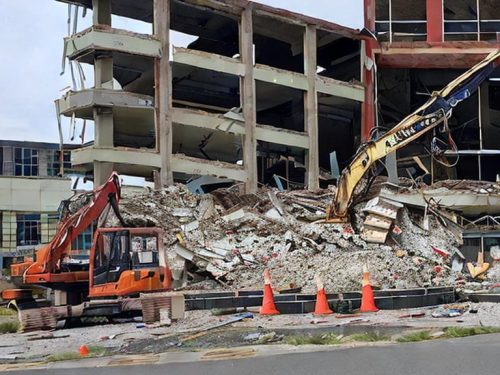 photo of the demolition of a commercial structure
